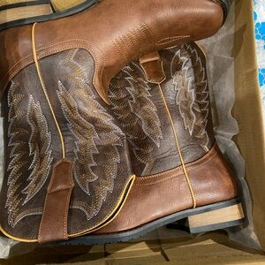 Brand new in box. Size 9 plastic cowboy boots.